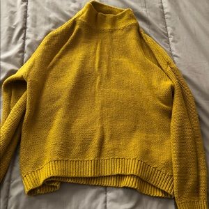 Mockneck mustard color sweater. Medium